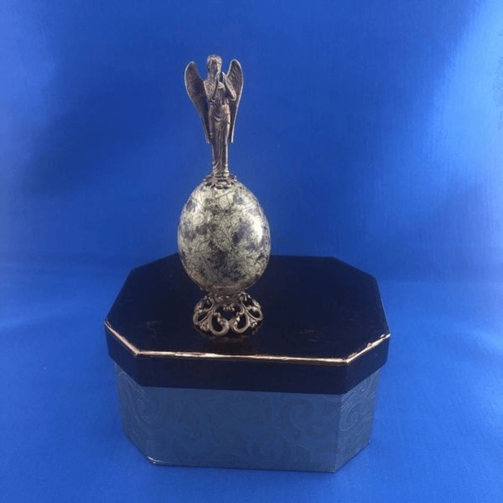 Green Marvel Egg With Brass Angel On Top