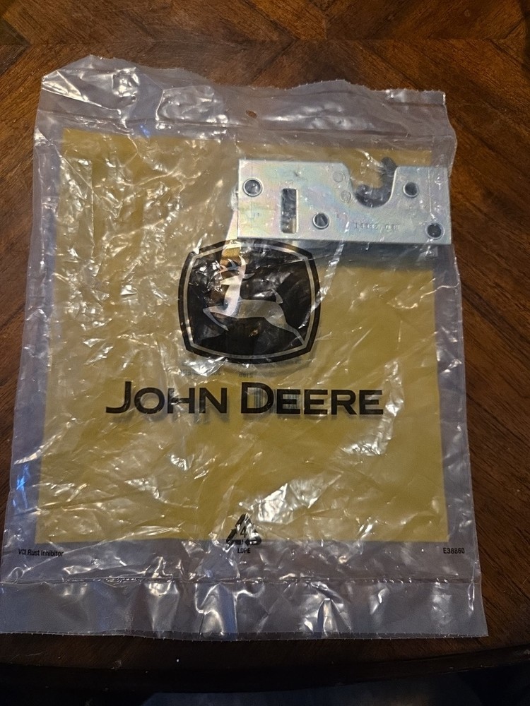 John Deere AT310702: Hold Open Latch, Left Side