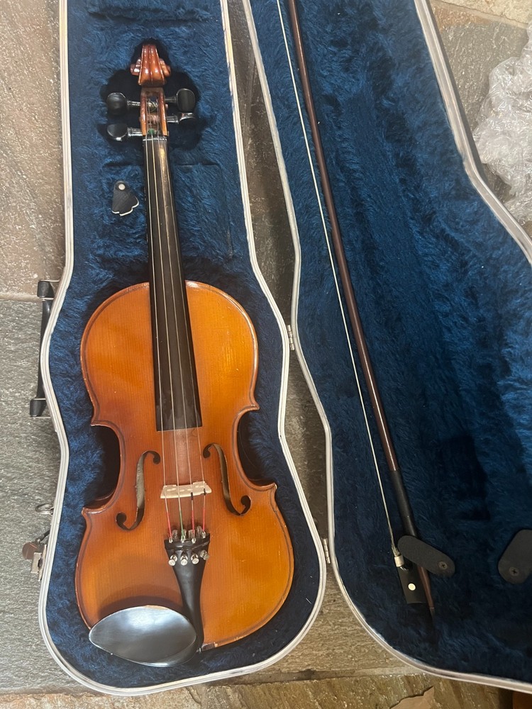 Violin with case and bow, full size.