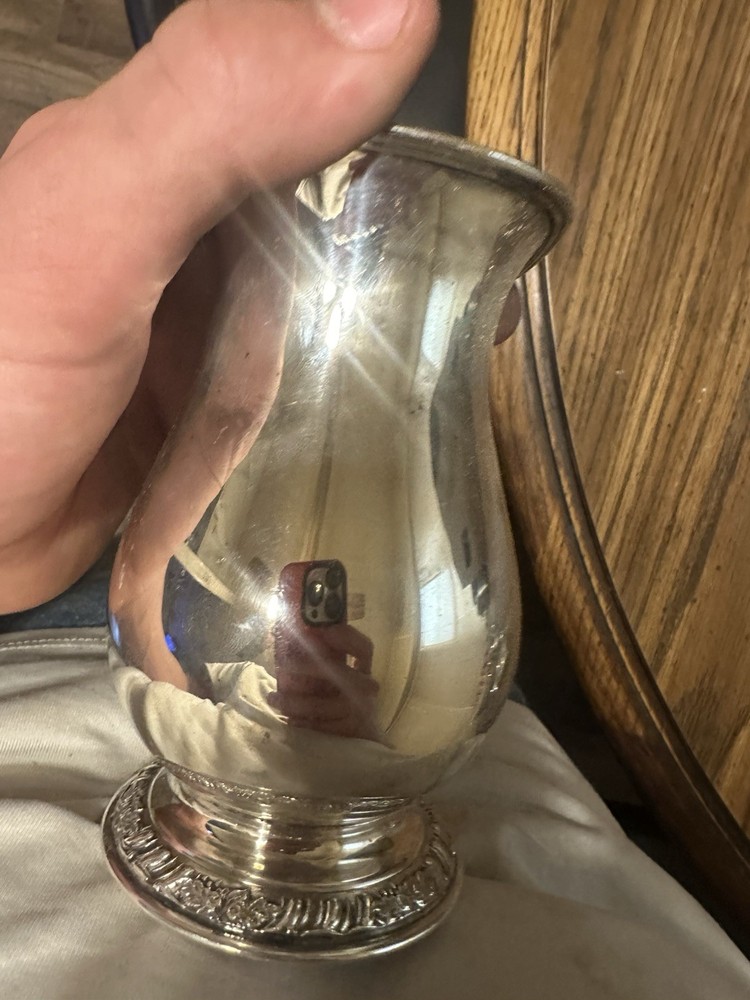 Set Of Four Silver Plated Cups.