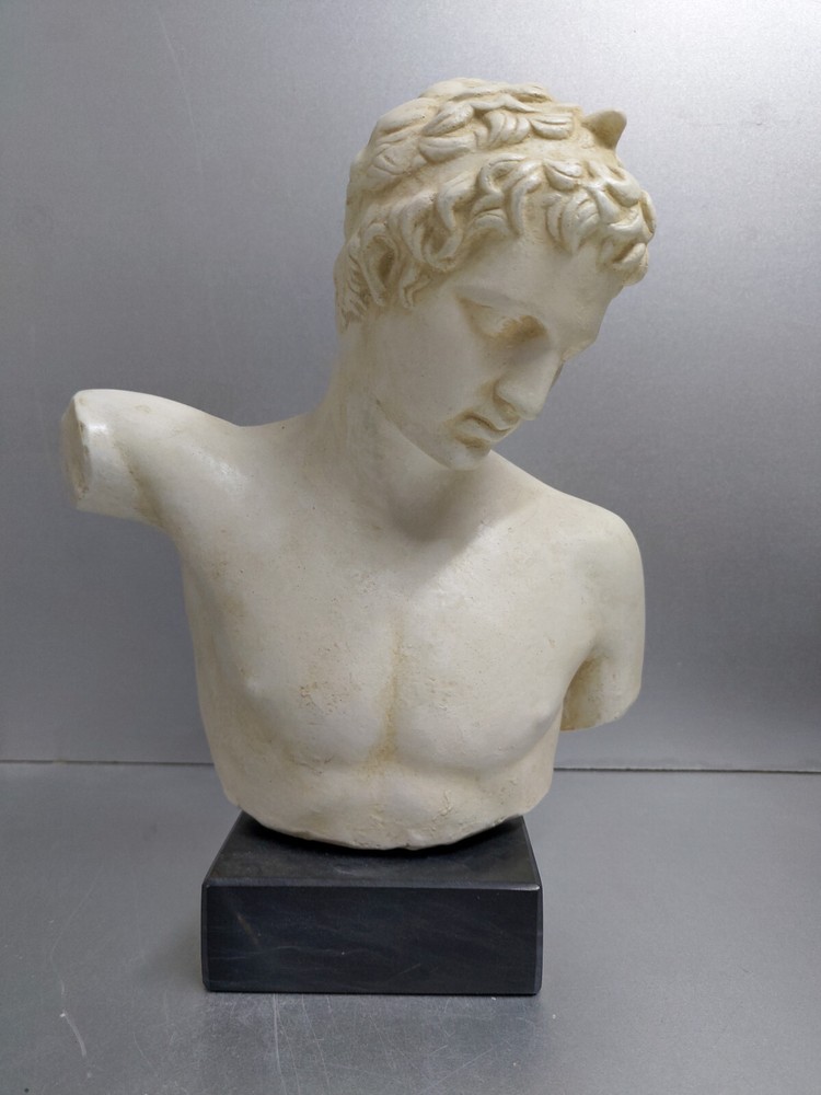 Ephebe bust sculpture on black marble base