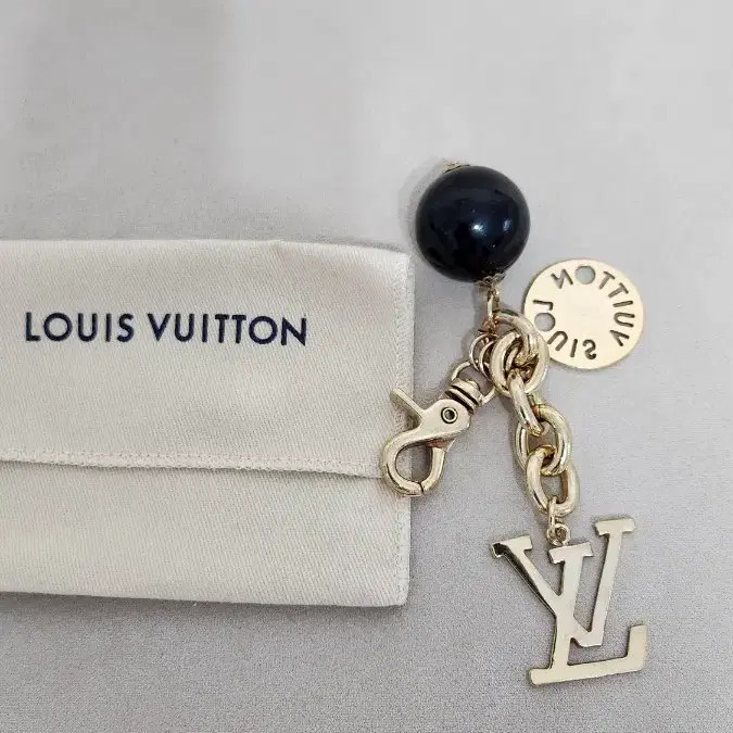 Louis Vuitton Gold LV Keyring - Authentic