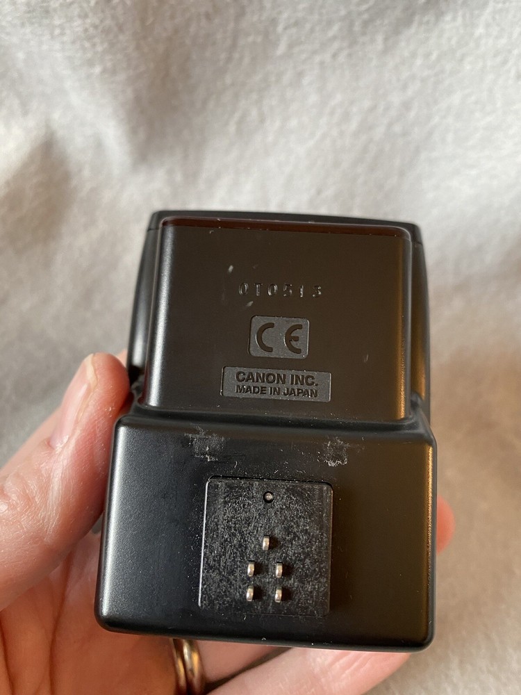 Canon Speedlite Transmitter ST-E2 And Book