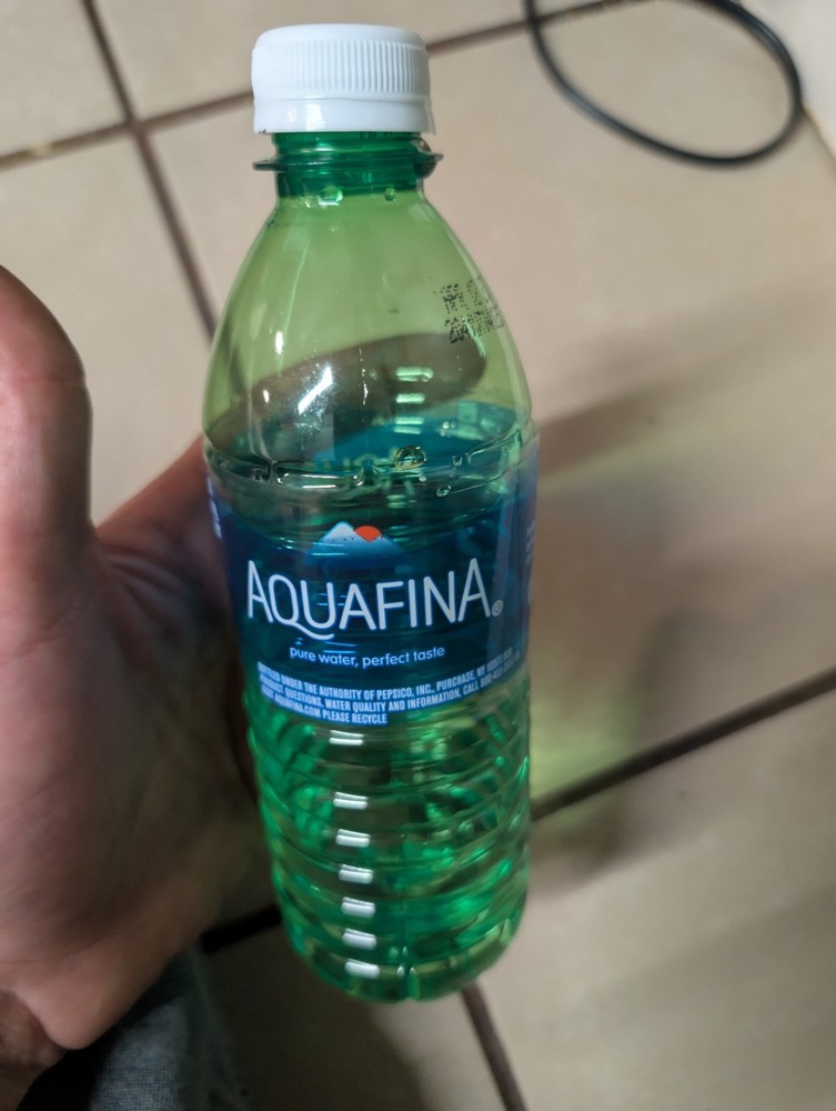 Green Hard Plastic Aquafina Bottle