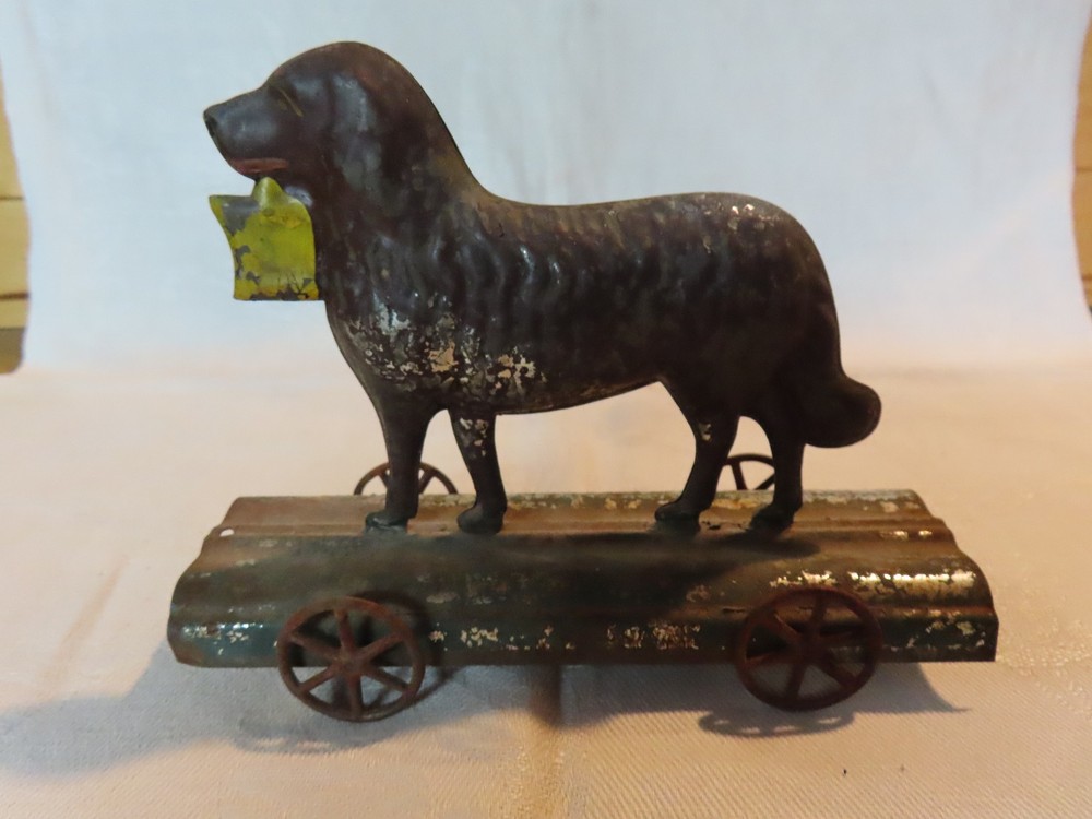 Antique tin dog pull toy
