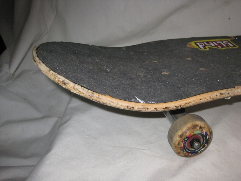 pre-owned skateboard Tensor trucks Psychedelic wheels Blind grim reaper deck