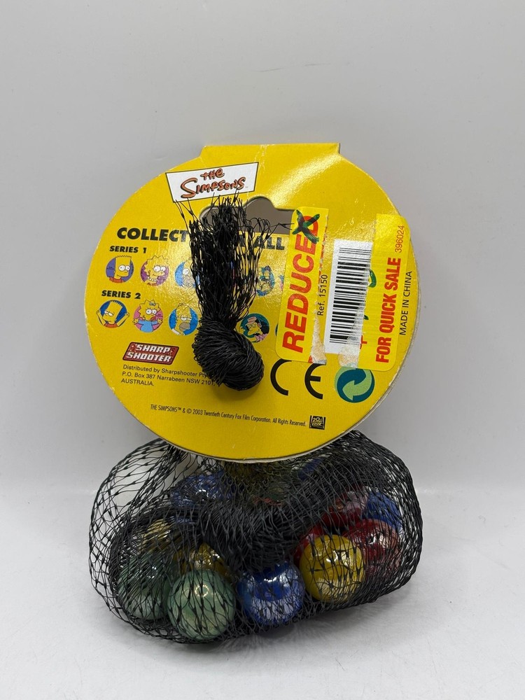 2003 The Simpsons Collectable Marble + 18 Assorted Play Marbles