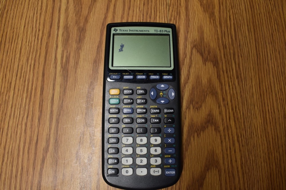 Texas Instruments TI-83 Plus  Graphing Calculator  Works Has screen damage