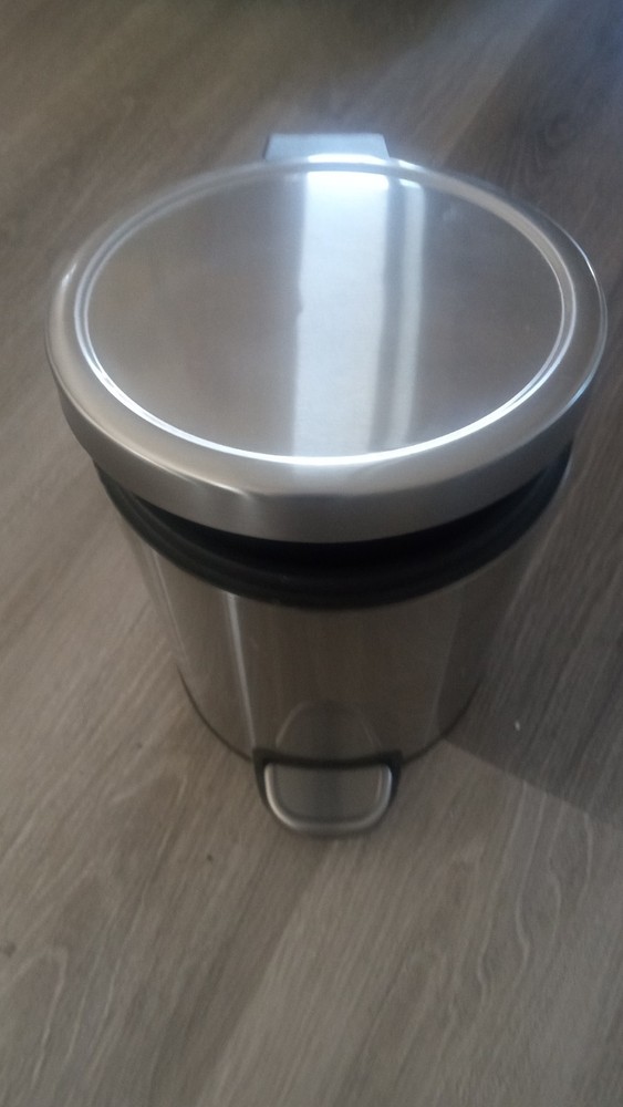 Small gray trash can