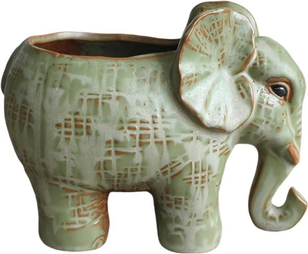 Cute elephant-shaped ceramic succulent planter.