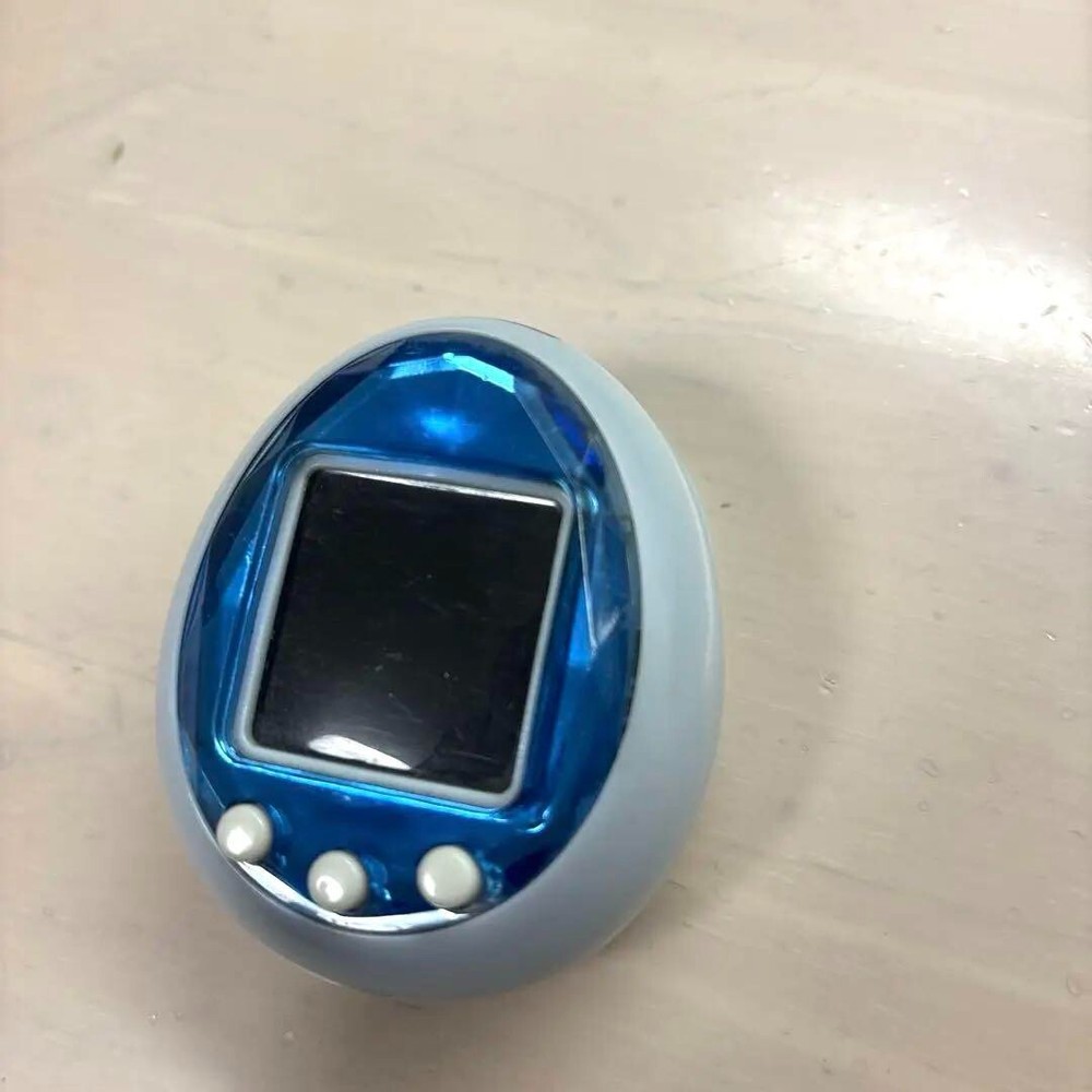 Bandai Tamagotchi iD Blue Silver