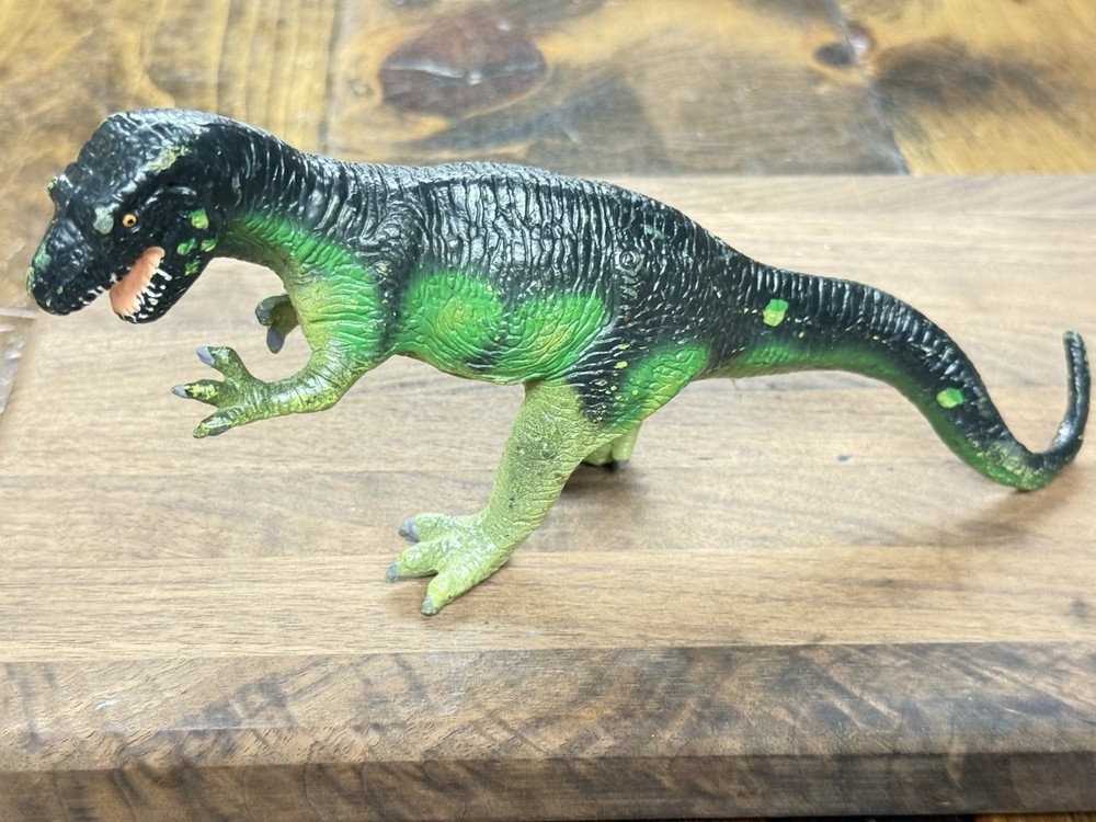 Carnegie Collection dinosaur models original and revised Allosaurus