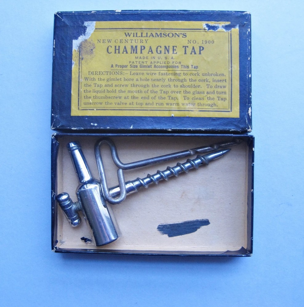 Three boxed champagne taps