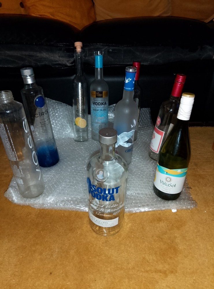 9 empty Spirit Bottles for different types