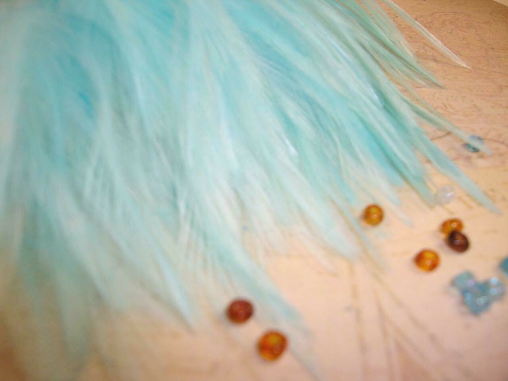 Chinese Rooster Saddle Feathers 4-5" - Strung - Robin's Egg Blue - 50 Pcs.