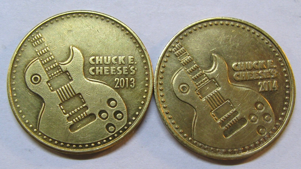 2013 & 2014 CHUCK E CHEESE ARCADE GAME BRASS COIN TOKENS * CHUCK E.ROCKS *