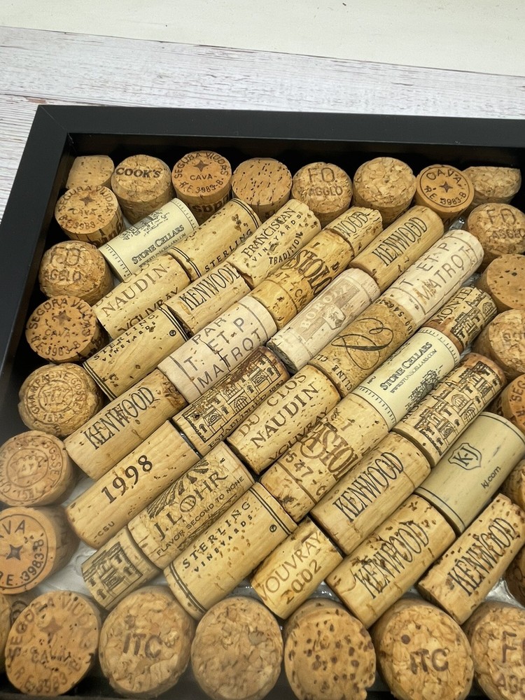 57 Assorted Wine Bottle Corks In Wood Frame 10"Tall x 10”W