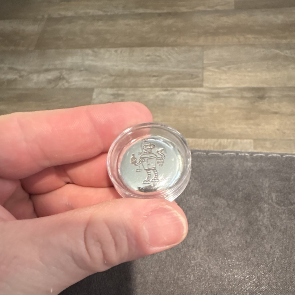 Bender 1 oz .999 silver hand pour