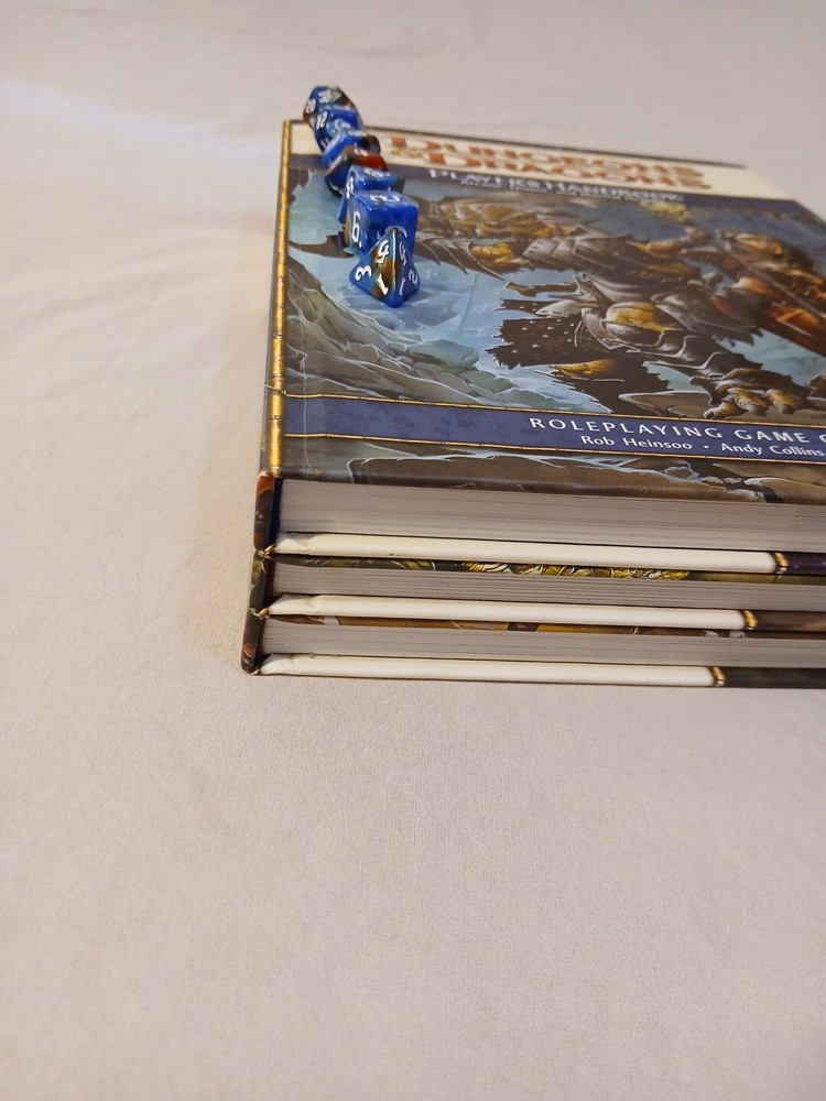 Dungeons and Dragons Core Rulebooks lot 4th edition starter set with 3 Dice Sets