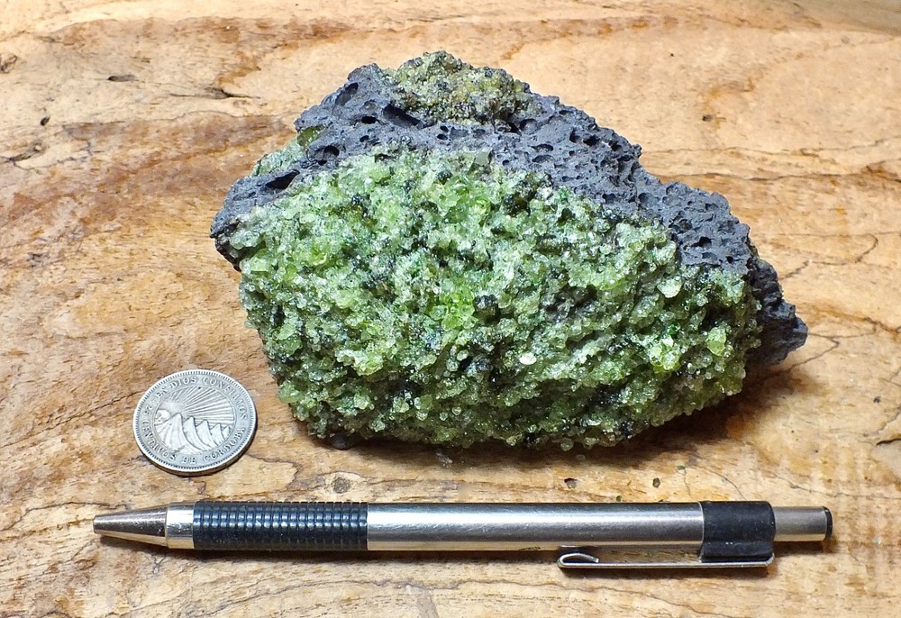 peridotite xenolith in vesicular phonotephrite - hand/display specimen