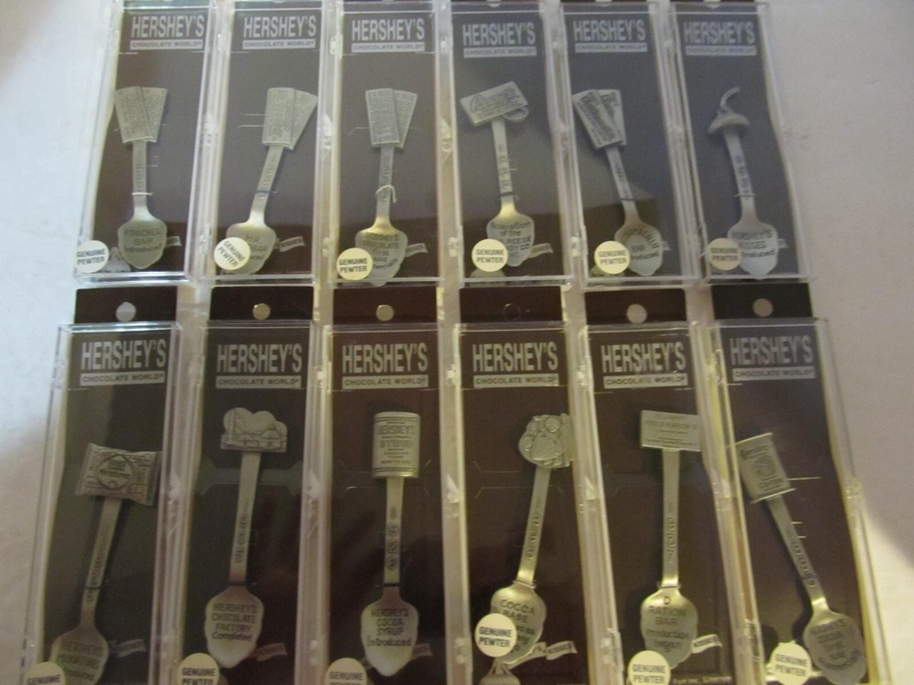 HERSHEY'S CHOCOLATE WORLD PEWTER SPOON COLLECTION 12 SPOONS