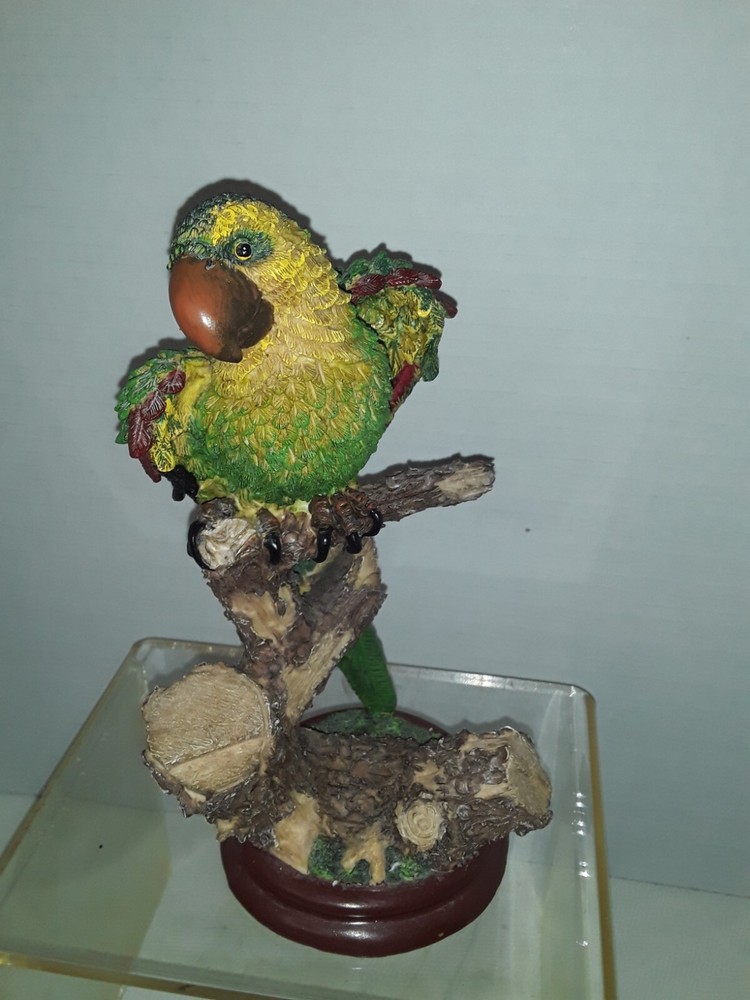 Flexing Macaw Figurine on Tree Stump Faux Plinth Base Approximately 9"