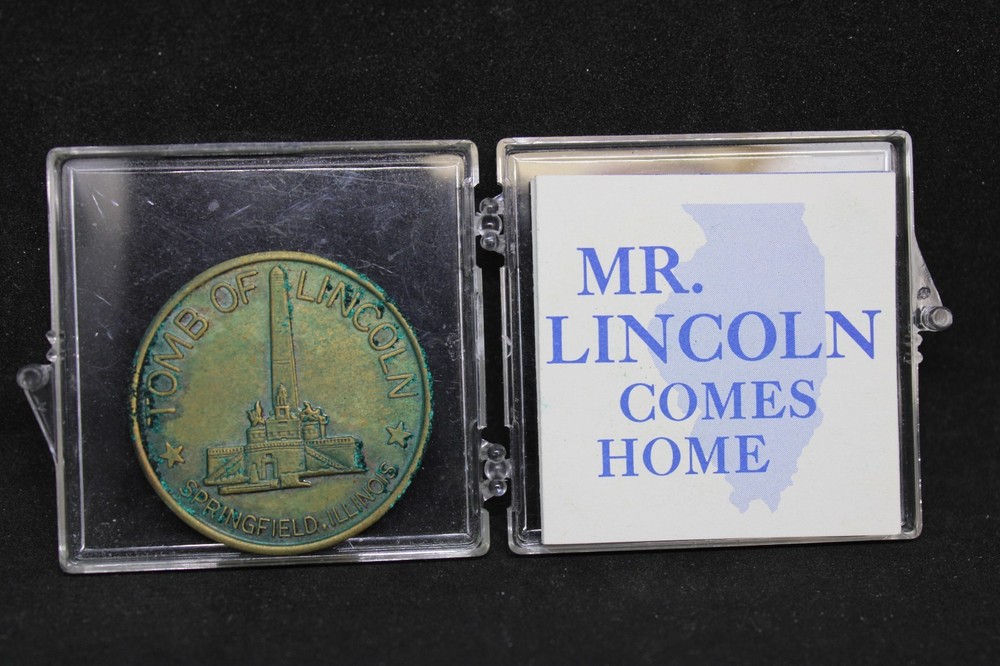Mr. Lincoln comes home token in case