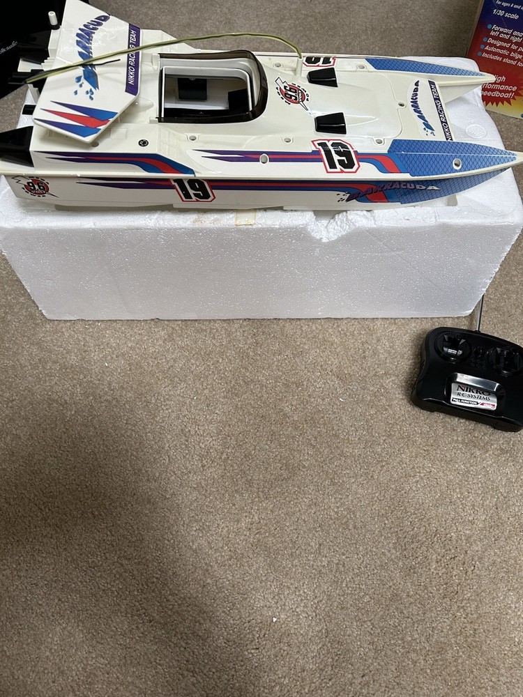 Vintage NIKKO BARRACUDA Radio Control Speed Boat with Remote control.
