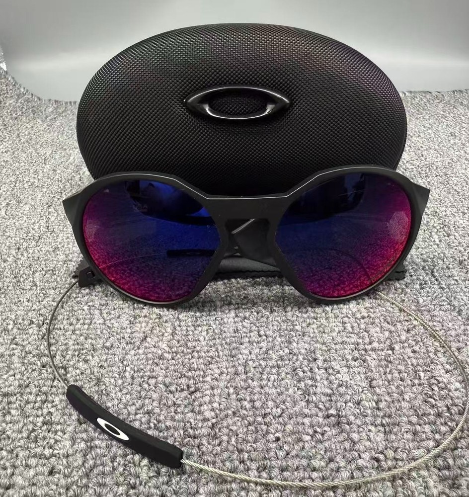 Oakley CLIFDEN OO9440 Matte Black Round Ruby Lens Sunglass New
