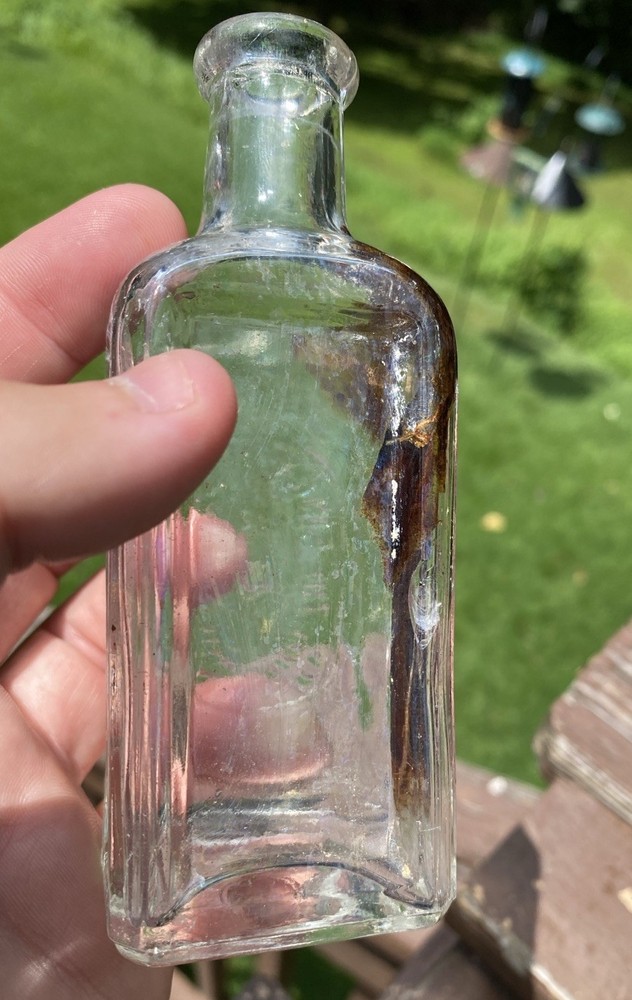 The Singer Sewing Machine Co Bottle