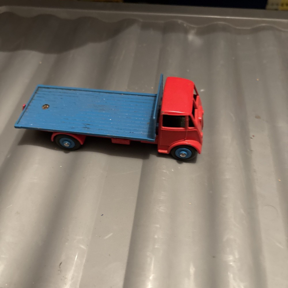 DINKY  GUY FLATBED 1950s.red & light blue .