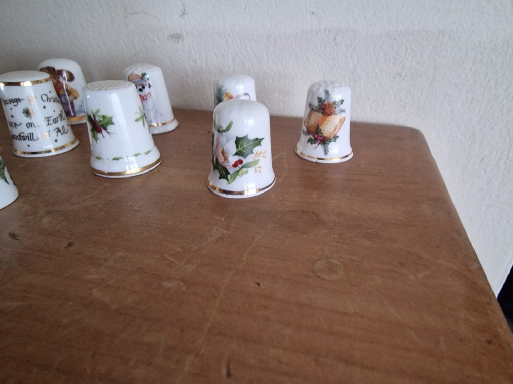 9 x Christmas themed thimbles