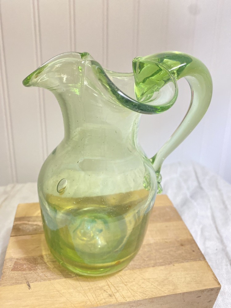 green glass pitcher vintage