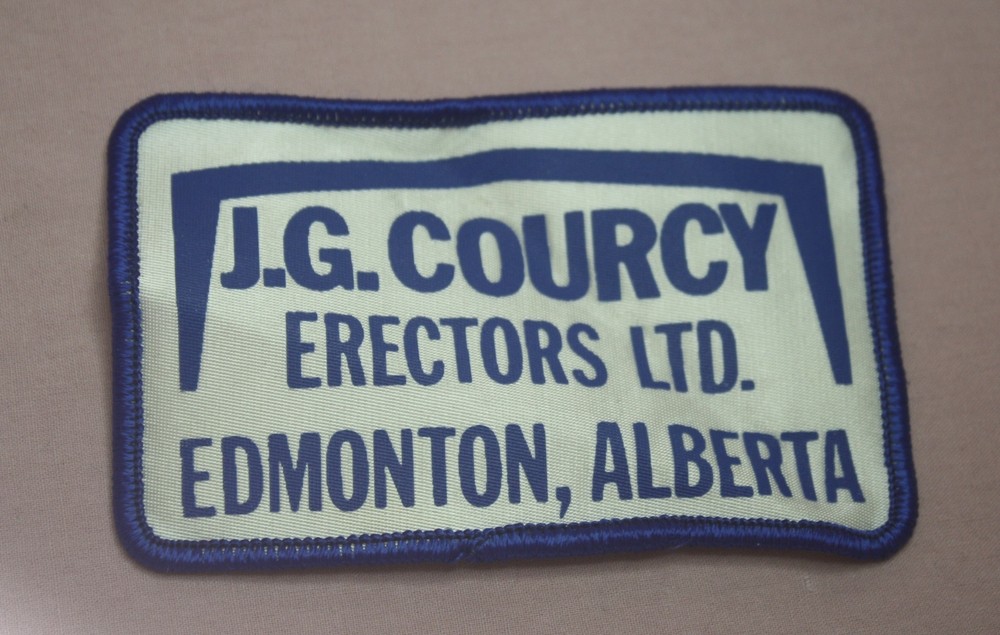 VTG. ADVERTISING  J. G. COURCY ERECTORS LTD. HAT/JACKET PATCH EDMONTON ALBERTA