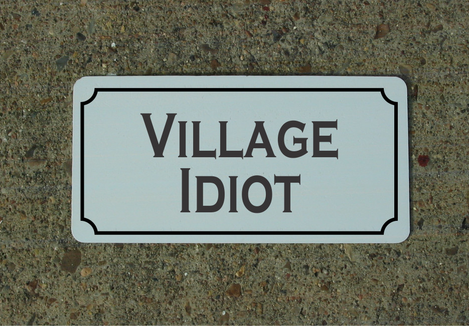 Village Idiot Metal Sign
