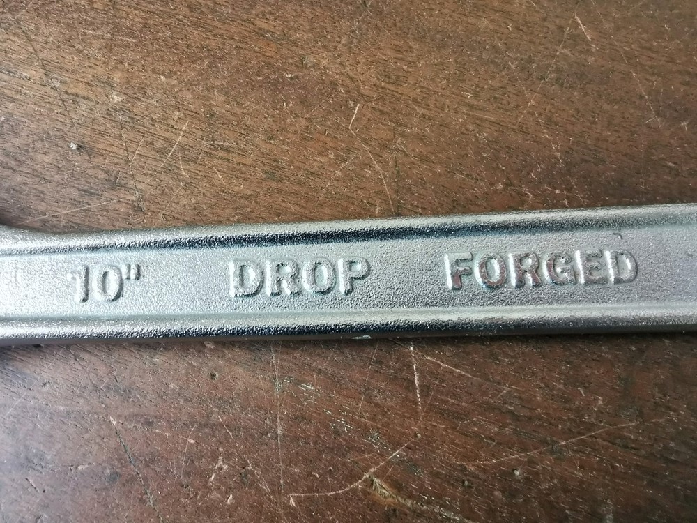 Modern 10" Adjustable Spanner to clear, no makers name.