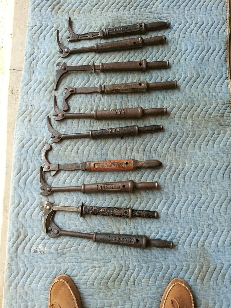 Collection of 8 different antique nail pullers