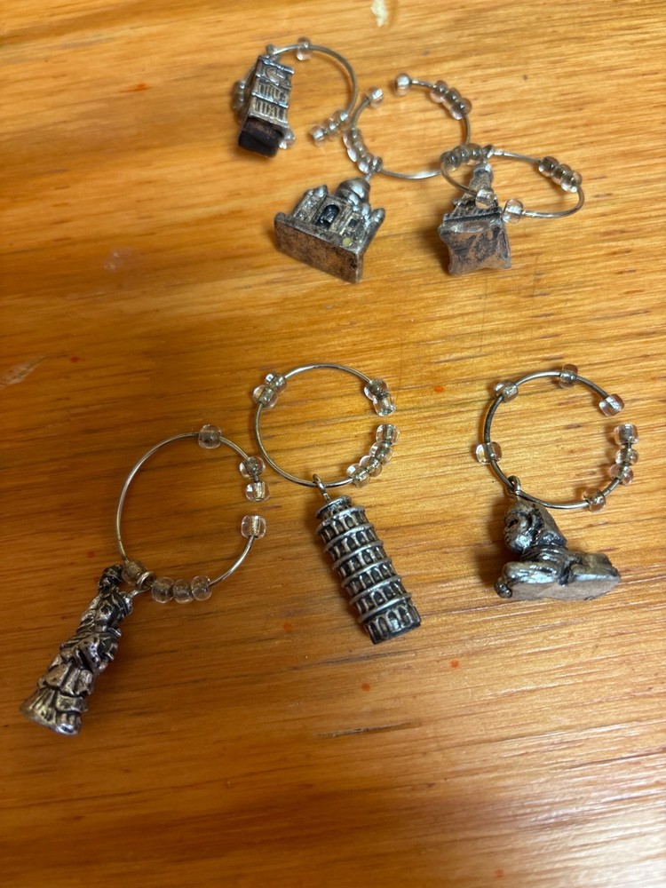 Wine charms and bottle openers