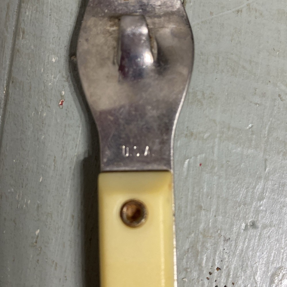 Vintage Bottle Opener USA Bakelite Handle?