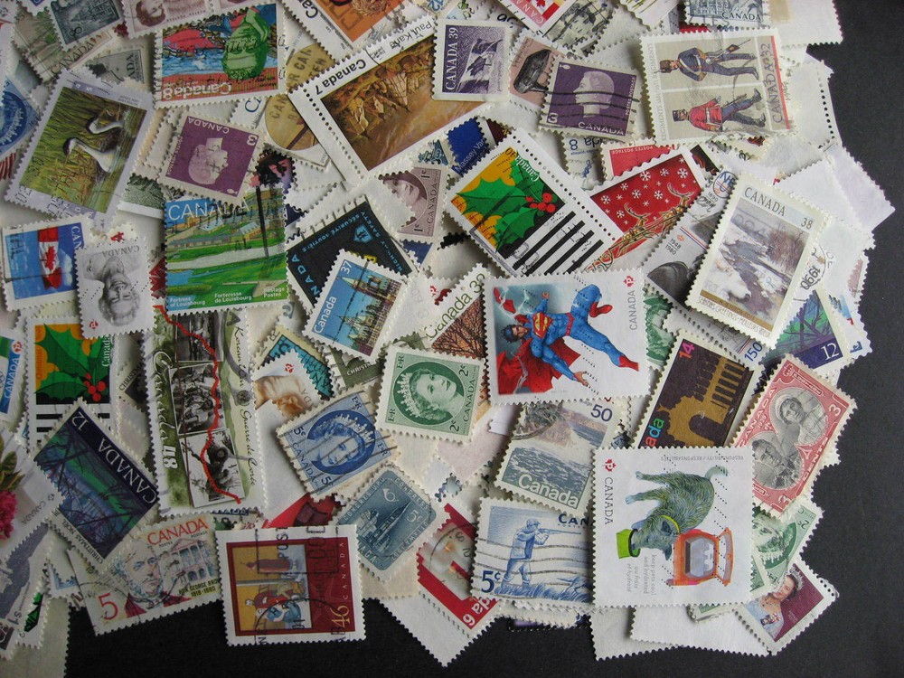Canada colossal mixture (duplicates,mixed cond) 2000 laid out35%comems,65%defins