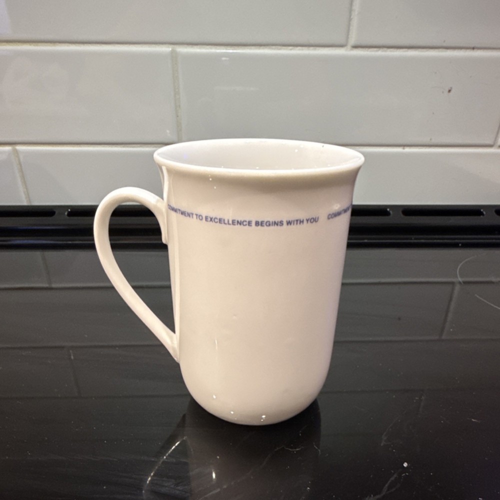 Midwest Express Airlines Collectible Mug White Plane Image Commitment Slogan