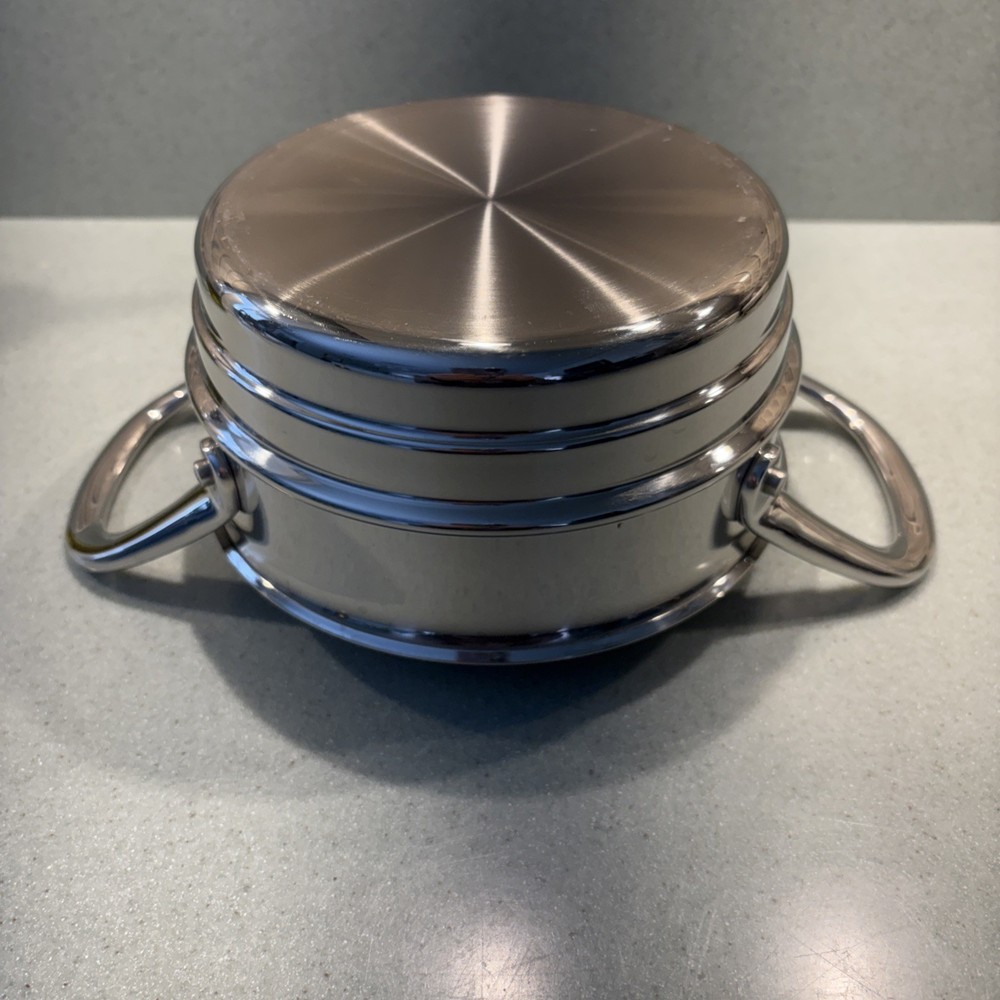 Stainless steel steamer insert or double boiler insert.