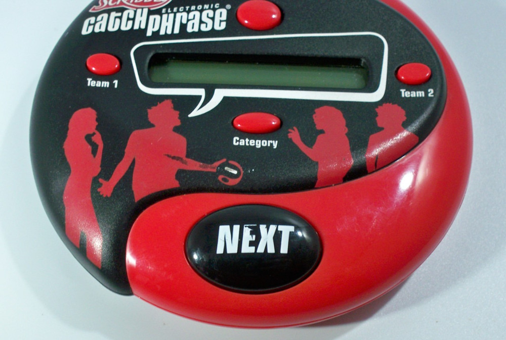 Hasbro Scrabble Electronic Catch Phrase Handheld Electronic Game