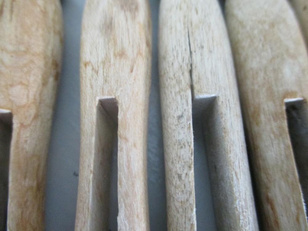 Antique Primitive wood clothes pins. Knobs on top.Two different styles. 46 total