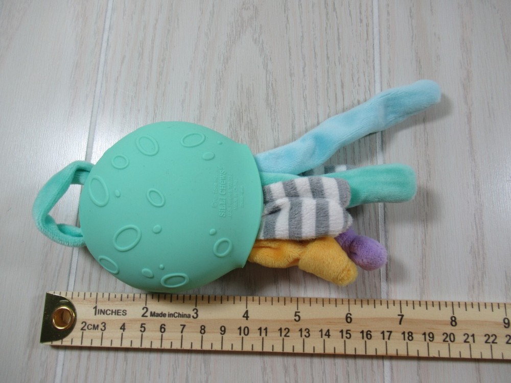 Silli Chews green octopus teether plush multi-colored legs tentacles gray stripe