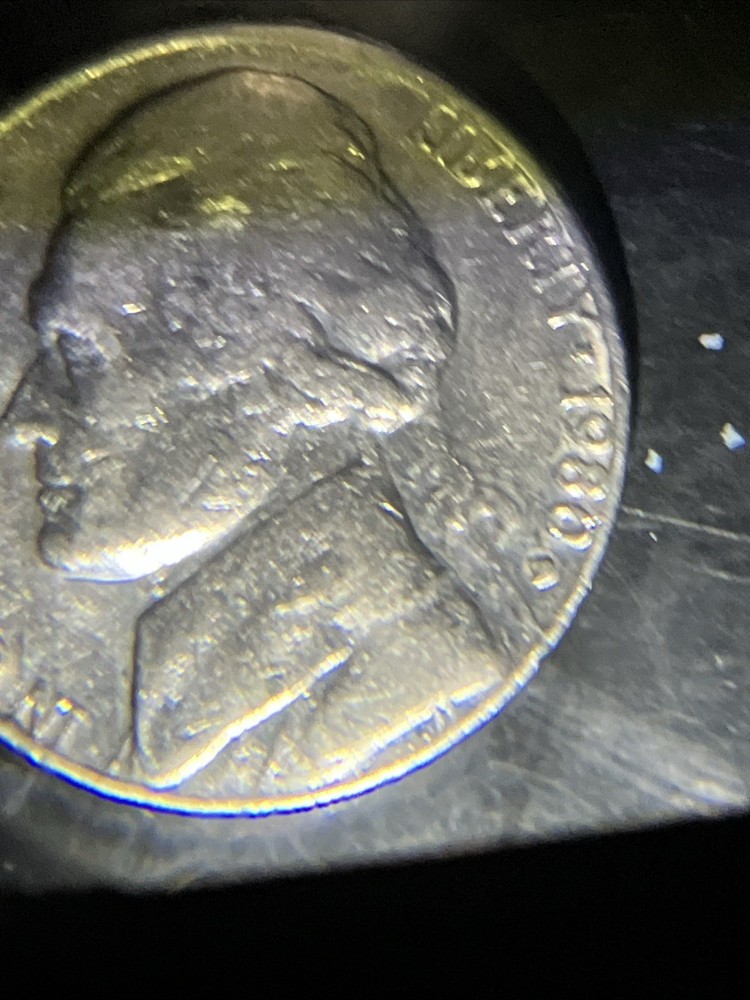 1980 D Nickle Struck Through Grease