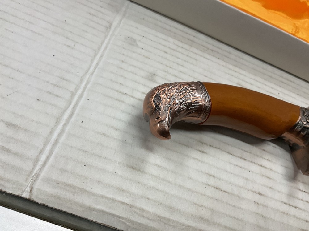 dagger with sheath gold color and eagle design