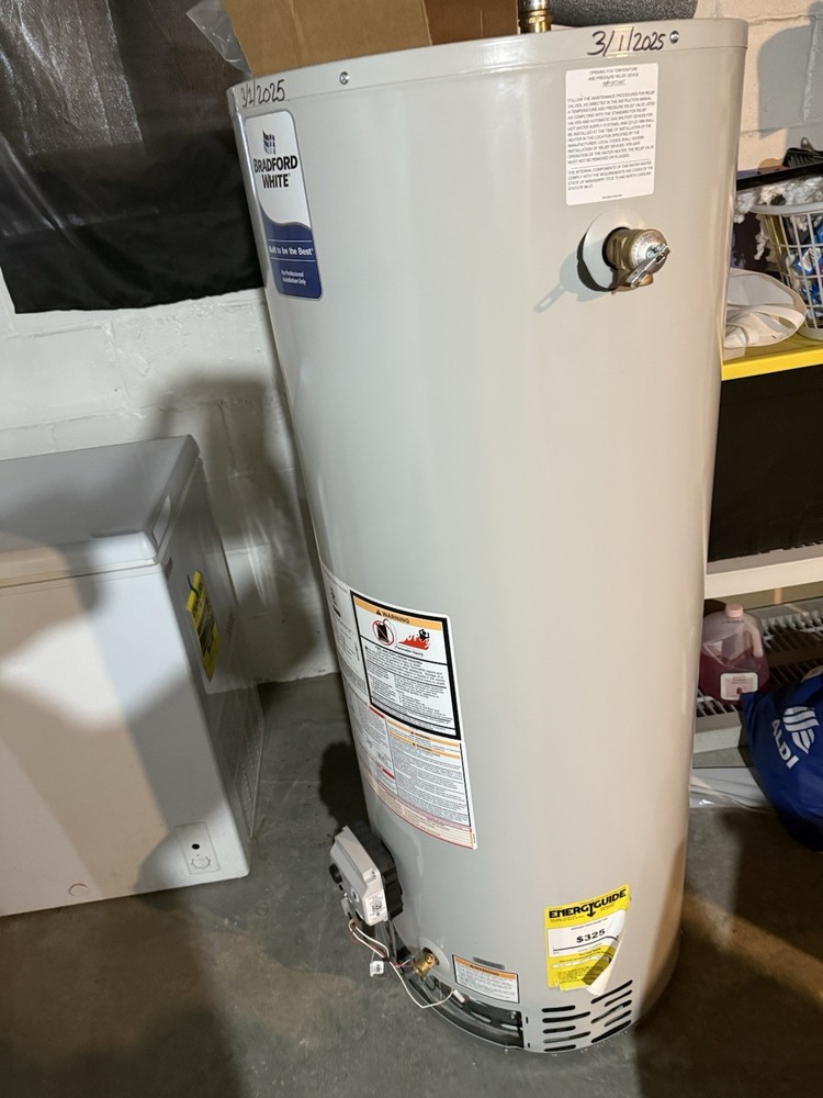 water heater !!! 700 or better offer! Never been used brand new ! 50 gallon