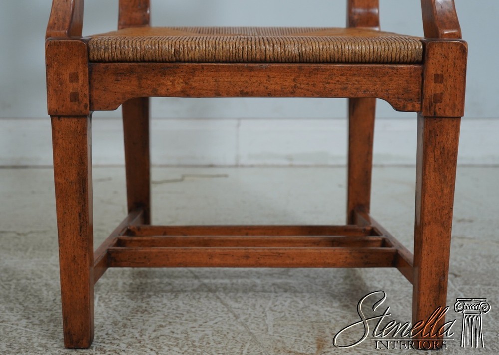 68471: Pair GUY CHADDOCK Distressed Ladderback Armchairs