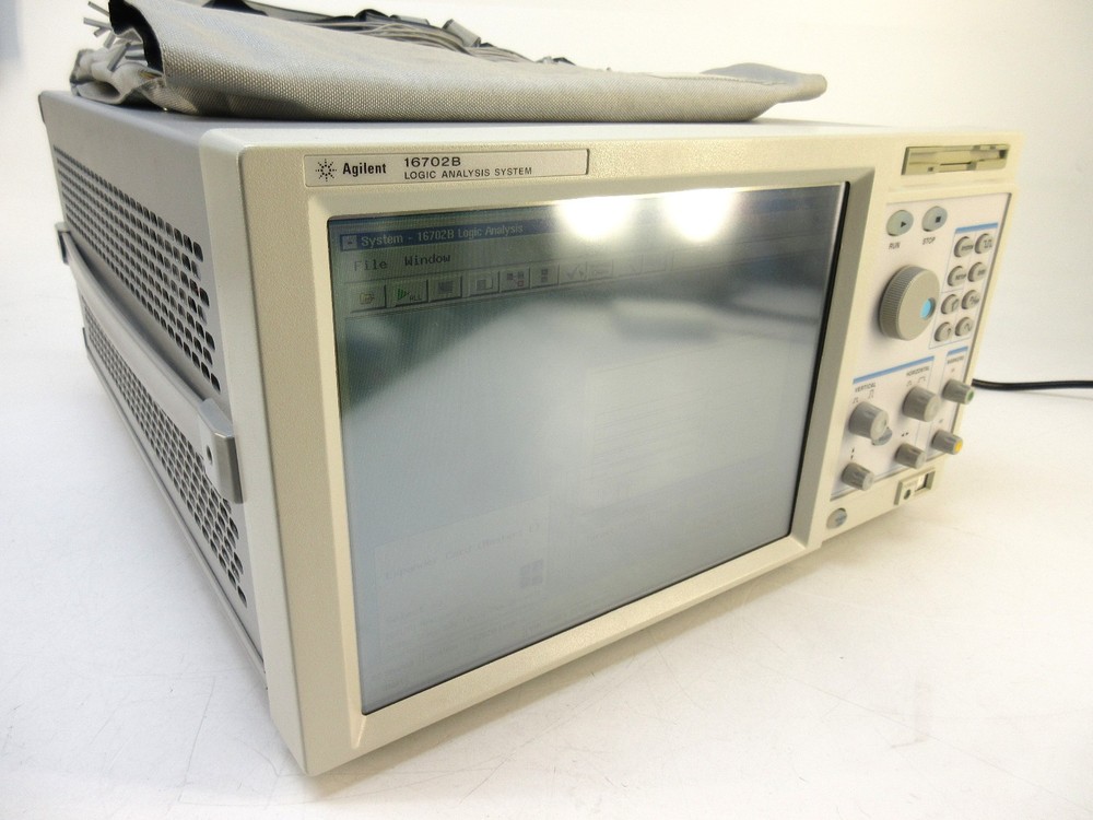 Agilent 16702B Logic Analyzer Analysis System w/ Opt # 003 and 2x 16717A Modules
